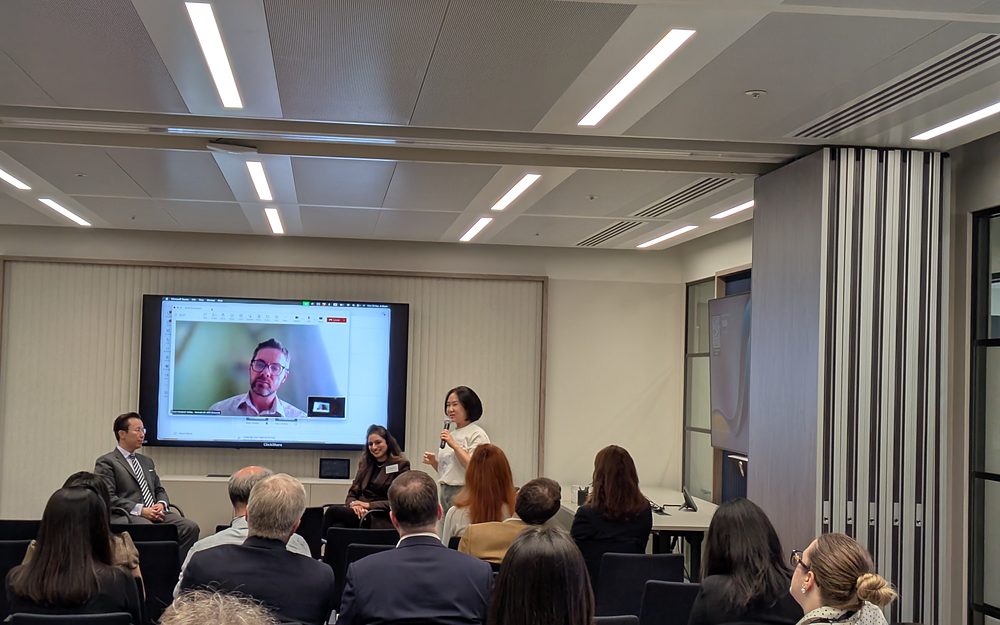 A panel at the first Korea Symposium in London, September 2025, with one speaker joining by video