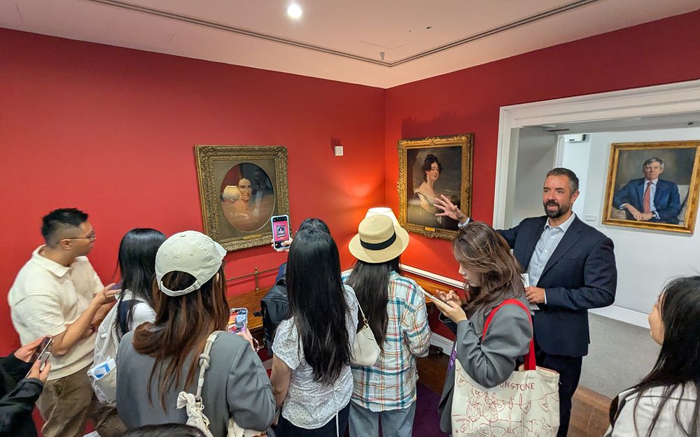 Students on a tour of the Christie&rsquo;s archives with their guide